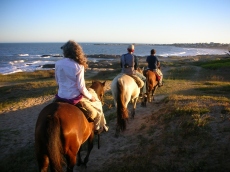 Christmas. Uruguay, Punta del Diablo. Christmas Eve horseback ride.