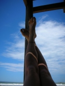 Christmas. Uruguay. Punta del Diablo. Putting my feet up on the beach.