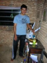 Ariel is my English student and is learning how to make pancakes. He's my best friend in site!